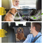 Dog behind the mesh window of a car seat cover while driver and passenger interact with it