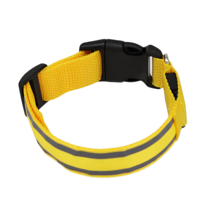 Yellow LED dog collar, unlit, on a white background