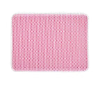 Pink honeycomb cat litter mat with white border, top view