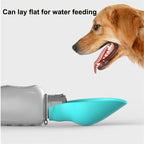 Portable dog water bottle trough laid flat for a dog to drink from