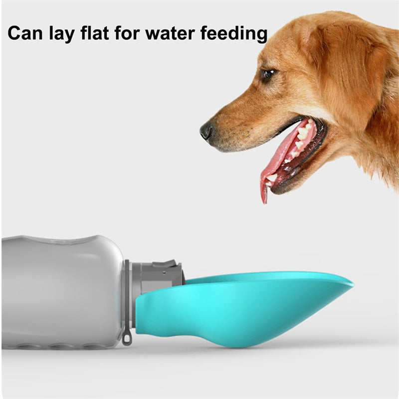 Portable dog water bottle trough laid flat for a dog to drink from