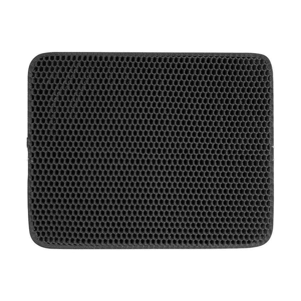 Black honeycomb cat litter mat, close-up top view