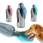 Portable dog water bottle with a golden retriever drinking from it
