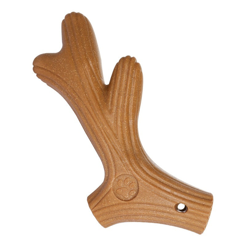 Dog chewing on the Wagbase wood chew bone